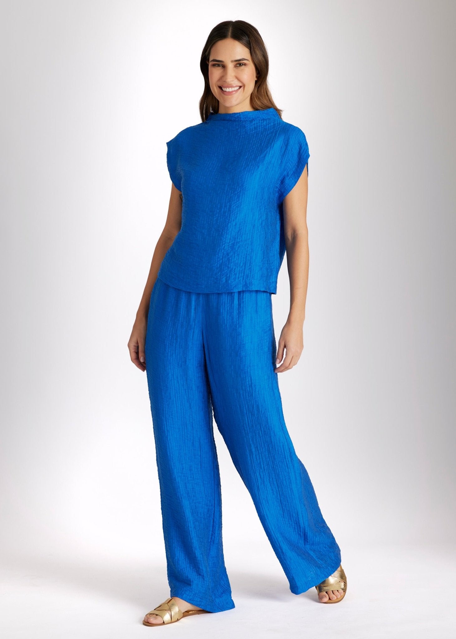 Lange Hose NAJUPI mit Gummibund, seitlichen Eingrifftaschen, weitem Bein und strukturiertem Stoff in Blau