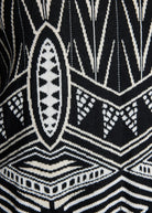 Gerader Strickpullover DARIBO mit hohem Kragen, langen Ärmeln und gelbem Muster