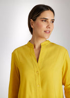 Lange Bluse BABLO mit durchgehender Knopfleiste, langen Ärmeln und kleinem Stehkragen in Gelb