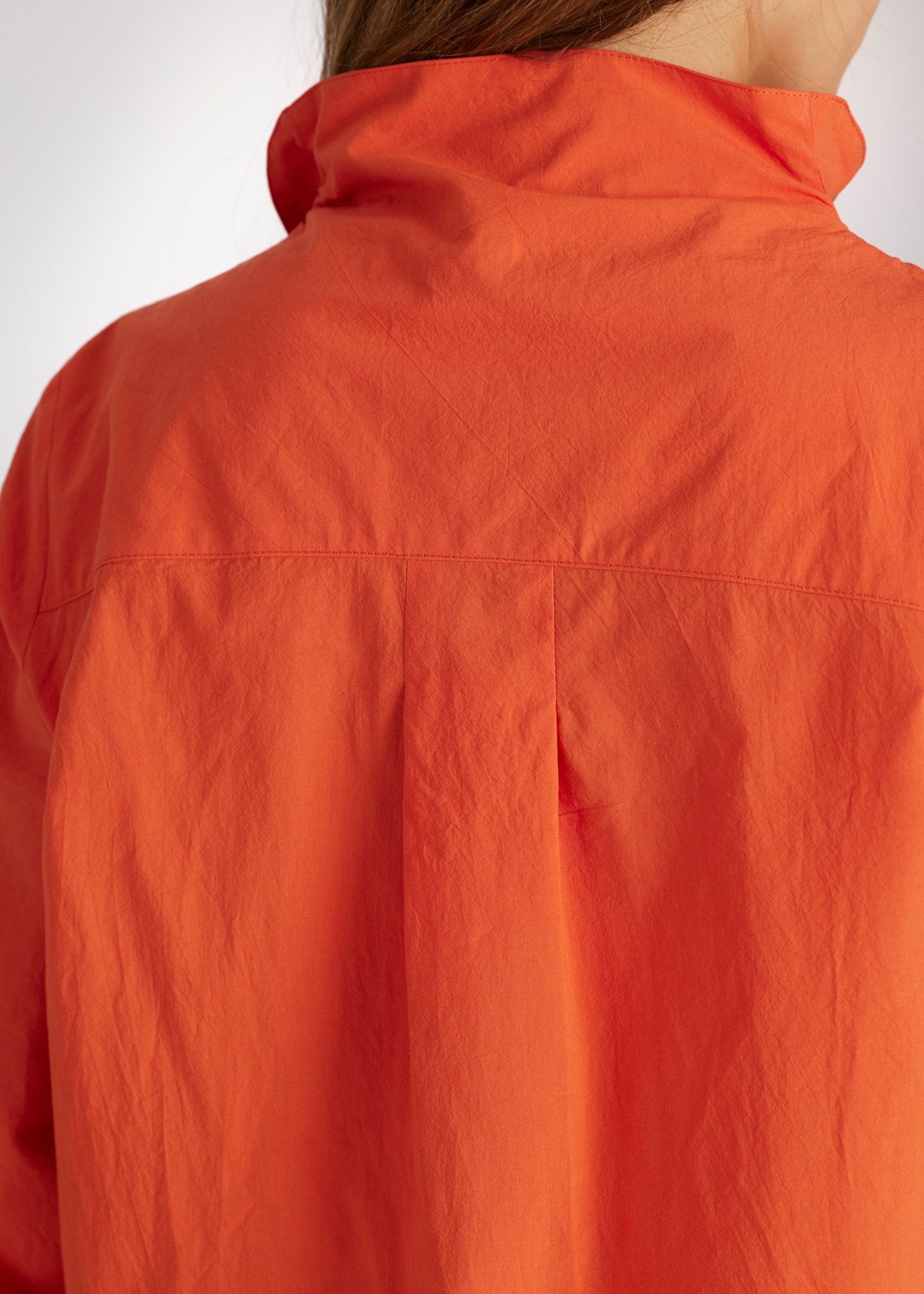 Bluse BLYZANTIS mit Kelchkragen, langen Ärmeln und kastiger Form in Orange